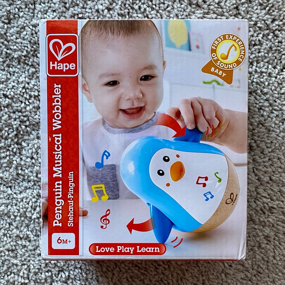 Hape | Penguin Musical Wobbler | 6M+ Sensory Toy